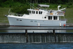 Maerin moored to canal wall by spillway