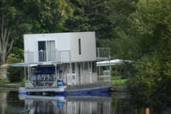 Paddle wheel houseboat