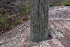 Pole in granite